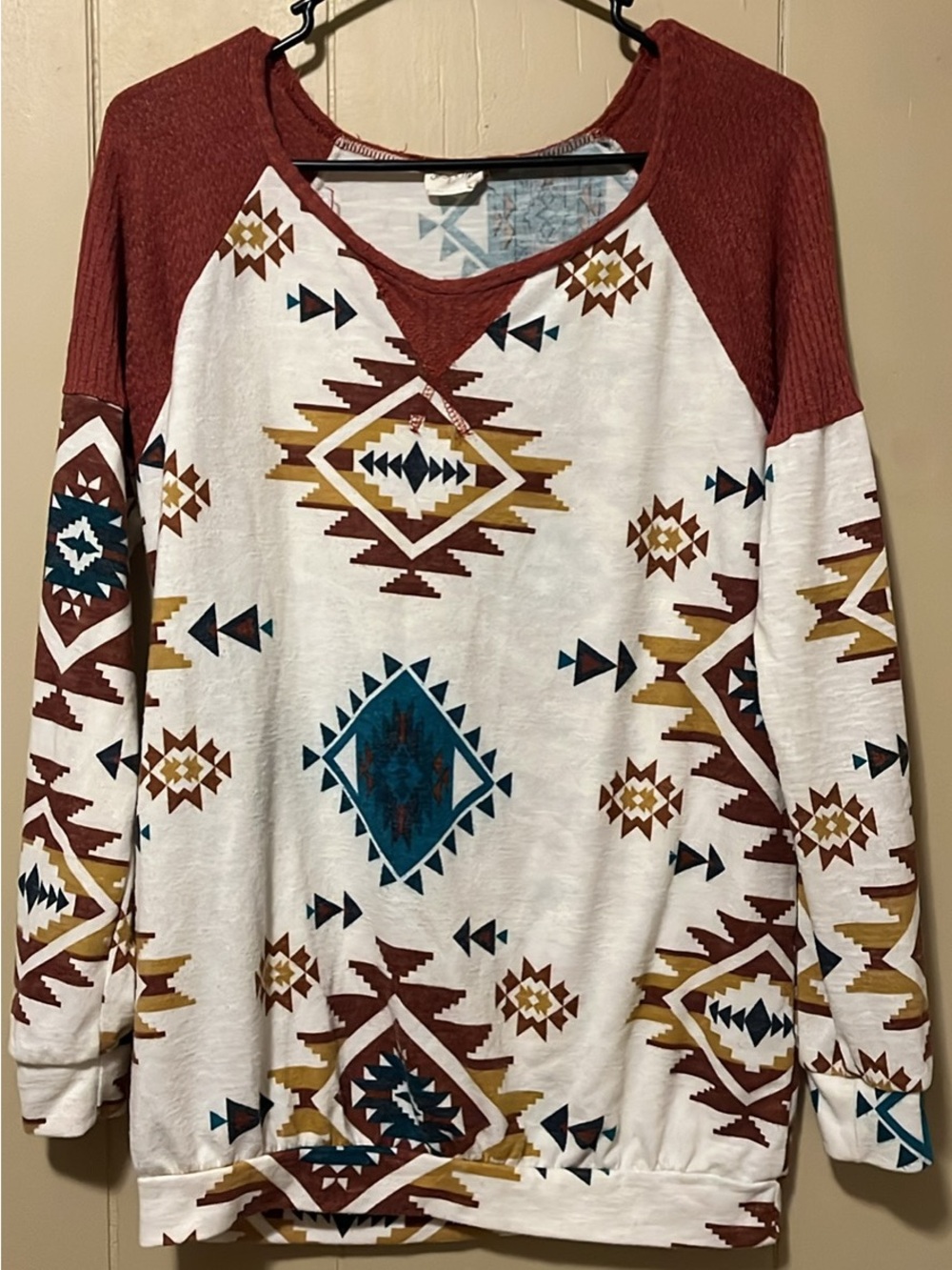 Lovely Melody Cream Top with Rust Trim and Teal Accents